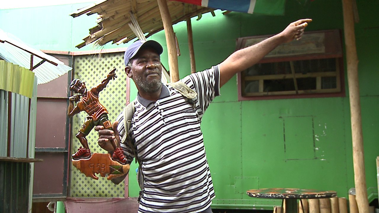 Random guy at Cafe Africa selling Bolt "9.58" figurine...