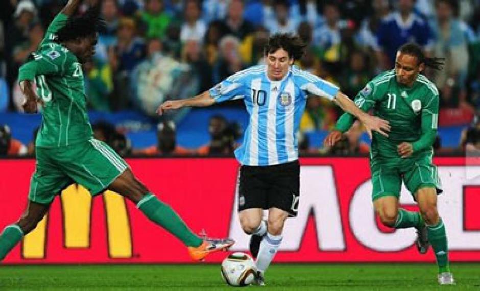 Lionel Messi darts past Osaze Odemwingie and Dickson Etuhu at the 2010 Word Cup -  who will come out on top on June 25th in Porto Alegre?