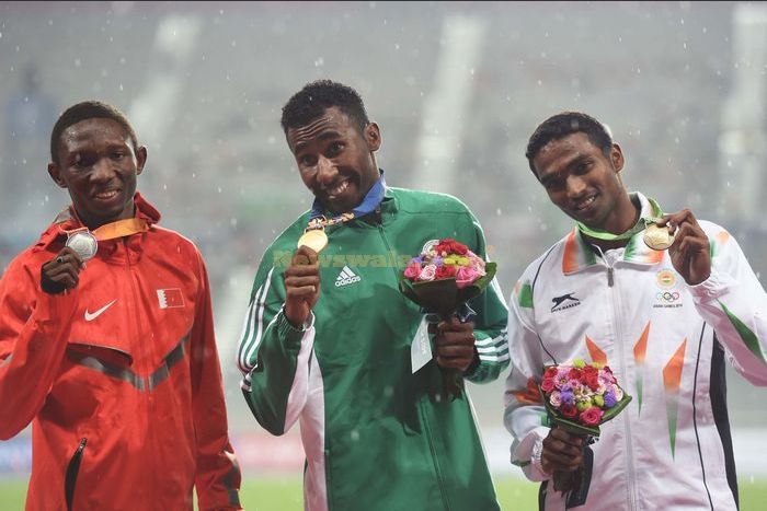 Abbas Abubakar collecting his Silver medal at the 2014 Asian Games.  (Photo credit: Xinhua/Lin Yiguang)(mcg)