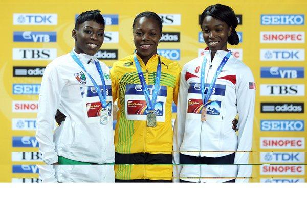 Murielle Ahoure won Silver in the 60m at the 2012 World Indoors behind Jamaica’s Veronica Campbell-Brown (C), while Tianna Madison of Great Britain (R) took bronze. (Photo Credit: Getty Images) 