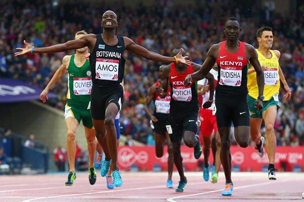 Nijel Amos celebrates his historic win over David Rudisha at the 2014 Commonwealth Games in Glasgow. (Photo Credit: Cameron Spencer/Getty Images Europe) 