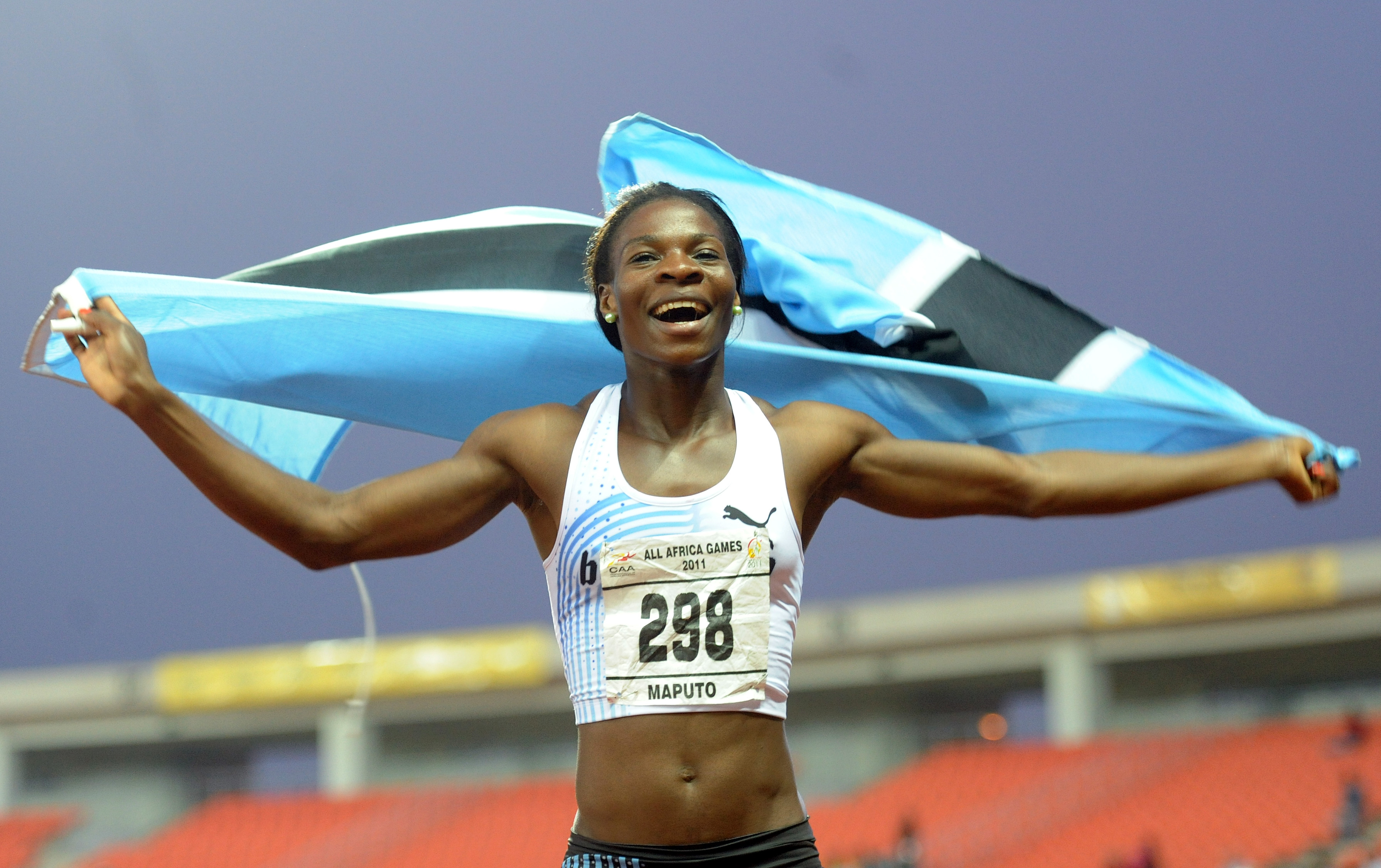 Amantle Montsho celebrates her 2011 All-African Games triumph in Maputo. (Photo Credit: www.bsnc.co.bw)