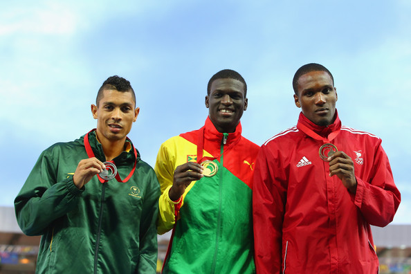 Silver medallist Wayde van Niekerk, gold medallist Kirani James and bronze medallist Lalonde Gordon pose with their medals. (Photo Credit: Mark Kolbe/Getty Images Europe)