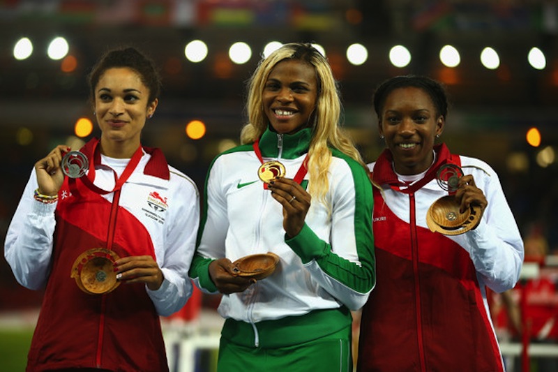 200m C'wealth Champ Blessing Okagbare of Nigeria flanked by Silver & Bronze medallists Jodie Williams and Bianca Williams of England. (Photo Credit: Richard Heathcote/Getty Images Europe)