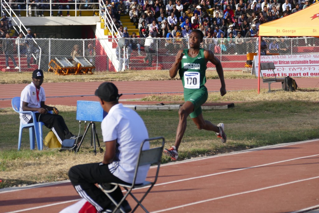 Theddus Okpara enroute winning a Silver Medal in the Long Jump event.