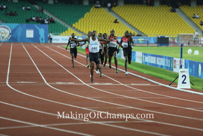 Amos defeats defending champion Makhloufi to win the 800m title.