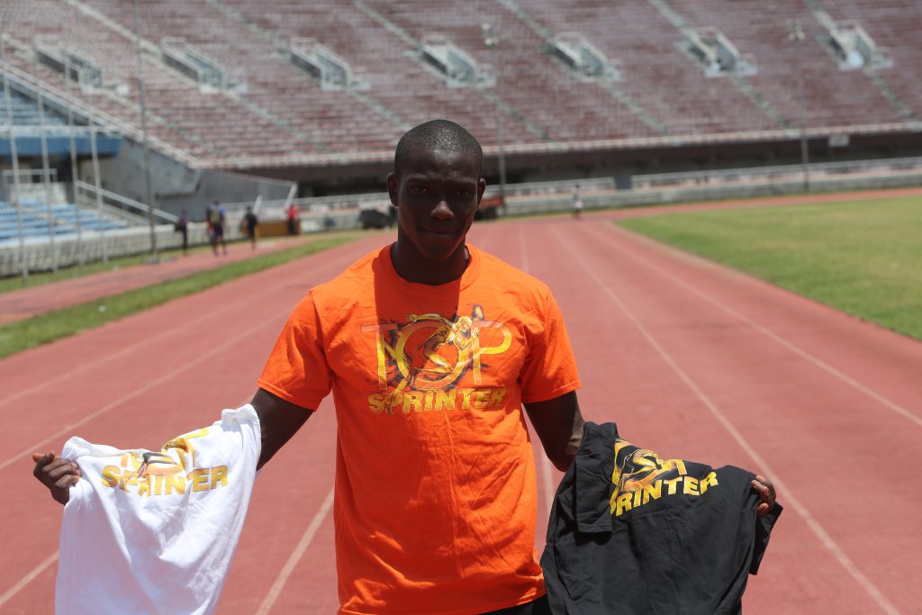 3rd Place finisher Edwin Peter sports his Top Sprinter T-Shirt and the extras he won.