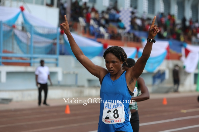 Joy Davies celebrates her victory in the women's 20km Walk.