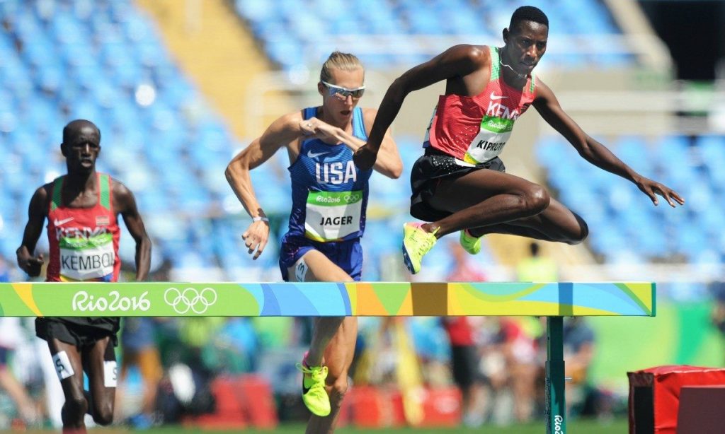 Kipruto chased by Evan Jager and Ezekiel Kemboi at the Rio 2016 Olympics. Photo Credit: Athletics Weekly