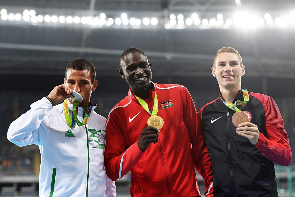 (L-R) Silver medalist Taoufik Makhloufi of Algeria, gold medalist David Lekuta Rudisha of Kenya and bronze medalist USA's Clayton Murphy pose during the medal ceremony for the Men's 800m Final. (Photo Credit: Quinn Rooney/Getty Images)