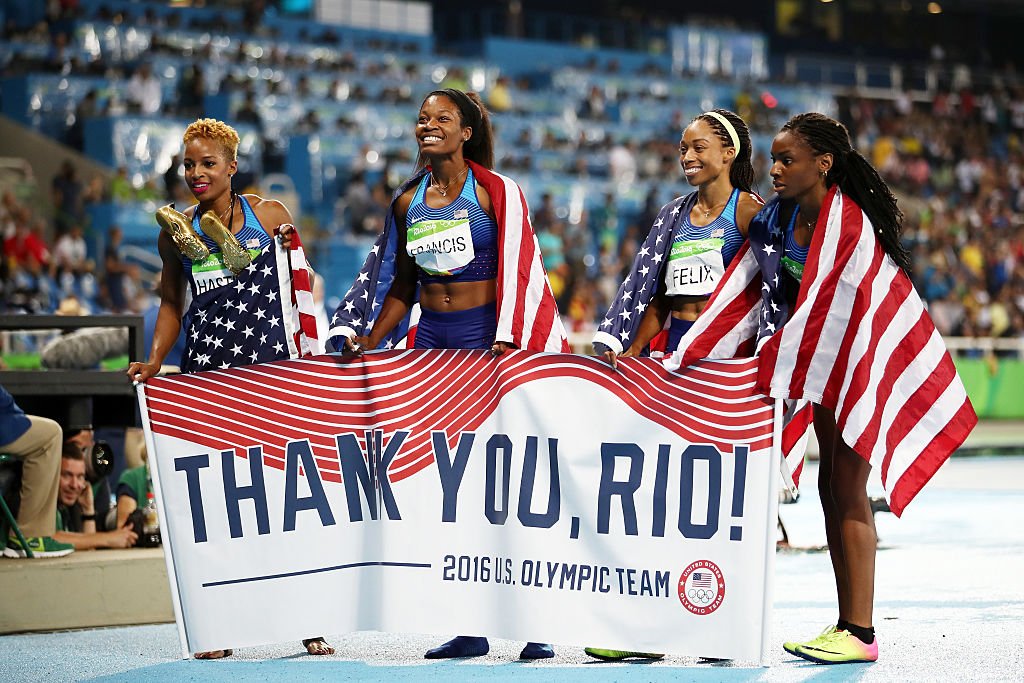 Team USA quartet: Natasha Hastings, Phyllis Francis, Allyson Felix & Courtney Okolo celebrating winning GOLD in women's 4x400m at Rio 2016 Olympics. Photo Credit: @iaaforg