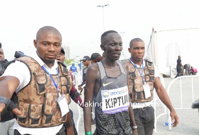 An exhausted Abraham Kiptum after winning the 2017 Access Bank Lagos City Marathon